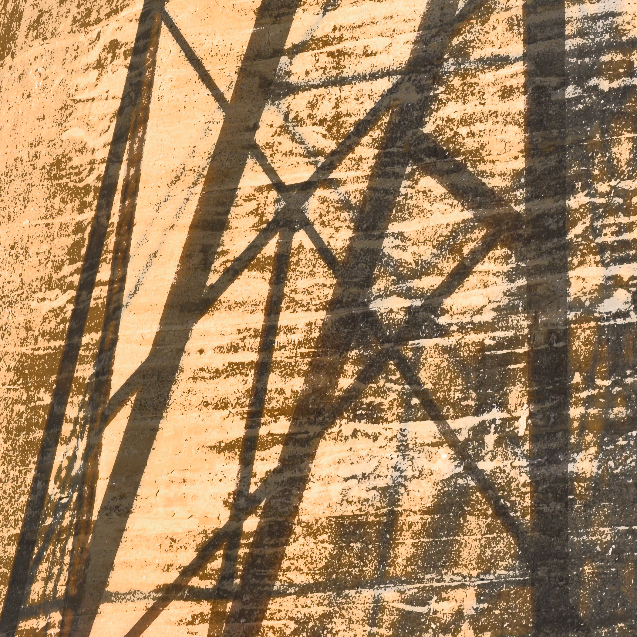 Photo of train trestle shadows on concrete abutment. Source image for Shadows Family patterns, seamless patterns, and prints.