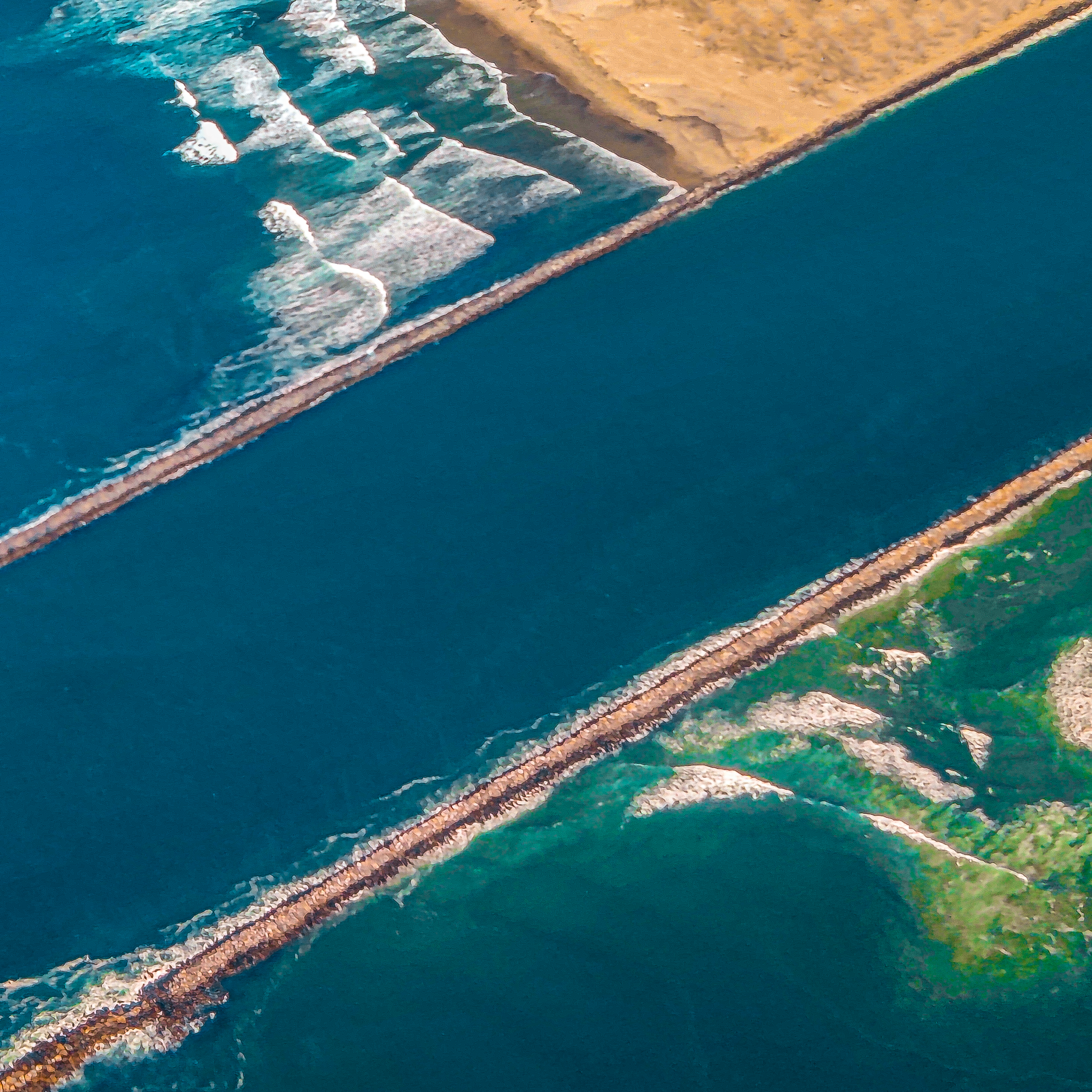 Aerial photo of Mission Bay jetties, San Diego, CA